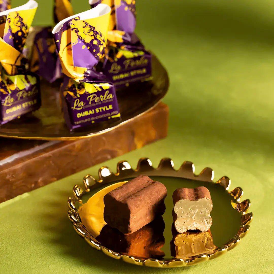Tartufi Dubai Style von La Perla di Torino, mit Milchschokolade bestäubt